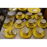 Shelley bone china tea set having monochrome decoration of dancing maidens against a yellow ground