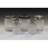 Five Waterford cut crystal glass dressing table jars having silver plated lids, all engraved