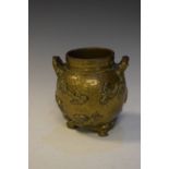 Early 20th Century Japanese bronze vase of two handled ovoid form, the planished body with prunus