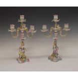 Pair of Dresden porcelain figural three branch candelabra, 36cm high