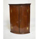 George III mahogany bow front wall hanging corner cabinet, 101cm high