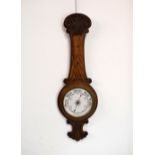 Victorian oak wheel barometer having ceramic dial, 84cm high