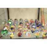 Large quantity of glass paperweights having various designs (30+)