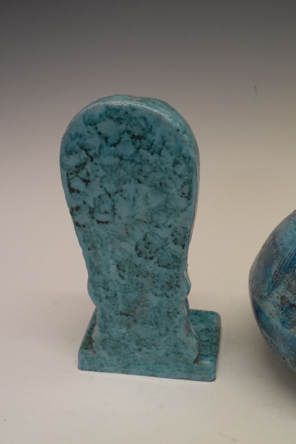 Pair of turquoise glazed pottery bookends formed as stylised female heads, together with a similarly - Image 3 of 11