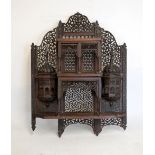 Late 19th century Indian carved hardwood wall shelves of architectural design with elaborate pierced