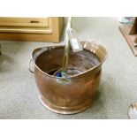 Copper helmet shaped coal bucket having brass loop handle