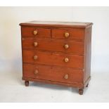 Victorian pine ox-blood finish chest of two short over three long graduated drawers having turned