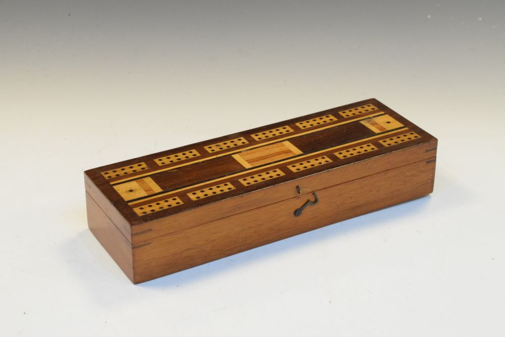 Late 19th/early 20th Century inlaid games box, the hinged cover with cribbage board, enclosing