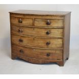 19th Century mahogany bowfront chest of two short over three long graduated drawers having turned