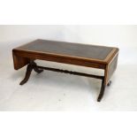Reproduction mahogany sofa table style coffee table having inset leather top, 105cm wide with