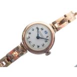 Lady's 9ct gold wristwatch with flexible strap, 28.6g gross approx