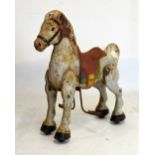 Mid 20th Century painted tin plate pedal horse, 77cm high