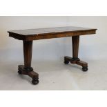 Early 19th Century rosewood library table fitted two frieze drawers, raised on octagonal supports,
