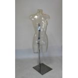 Unusual moulded plastic mannequin torso, on chromed stand and mirrored base, 128cm high