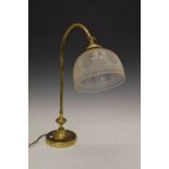 Brass desk lamp having frosted glass shade
