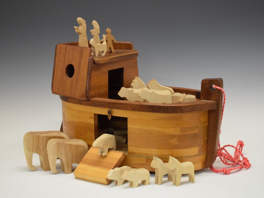 Scratch built pine and mahogany pull-along Noah's Ark with animals, 50cm long