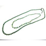 Two jade bead necklaces, 40cm and 68cm long respectively (2)