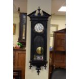 Early 20th Century ebonised twin weight-driven Vienna wall clock, with Roman chapter ring and