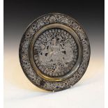 Indian brass and white metal tray or salver, the dished field with pierced overlaid white metal