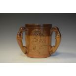 Stonewater salt glazed three handled tyg, the handles being greyhounds, with hunting decoration,
