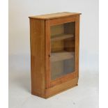 Stripped pine and walnut bookcase fitted three shelves enclosed by glazed doors, 64cm wide