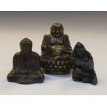Three small Eastern figures, the largest Hotei or Budai, 8.5cm high, a Buddha and another (3)