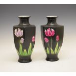 Pair of late 19th/early 20th Century hexagonal pottery vases having stencilled decoration of flowers