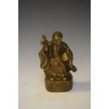 Japanese bronze figure of Jurojin, holding a staff and a peach symbolic of longevity, impressed seal