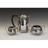 George V silver hot water jug, two-handled sugar basin and milk jug, Birmingham 1933, 19.3toz