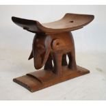 Large carved West African (probably Ghana) stool in the form of an elephant, 58cm wide
