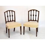Pair of early 20th Century Sheraton Revival mahogany dining chairs, each with bowfront seat