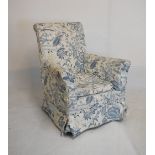 Early 20th Century fireside easy chair with loose covers and squab cushion