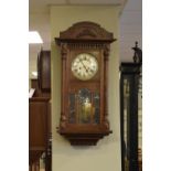 Early 20th Century beech or fruitwood-cased wall clock with silvered Roman dial, spring-driven