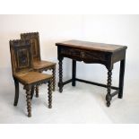 Late 19th/early 20th Century heavily carved side table fitted one frieze drawer, and a pair of
