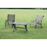 Black painted wrought iron and slatted wood garden set comprising: a pair of armchairs, 61cm wide