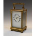 Early 20th Century brass carriage timepiece, 11.5cm high excluding handle