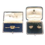 Gieves - Yellow metal and enamel bar brooch with crown design in fitted box, together with
