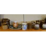 Quantity of studio pottery tankards etc