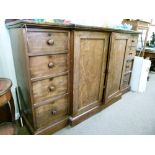 Early 19th Century mahogany breakfront low linen press, fitted two blind panel doors enclosing