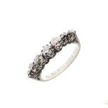 Mid 20th Century platinum and seven-stone diamond ring, of graduated stones, shank stamped Plat,