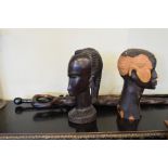 Two African hardwood carved busts and two carved walking sticks