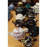 Large collection of late 19th/early 20th Century tea pots etc
