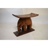 Carved West African (probably Ghana) stool in the form of an elephant, 42cm high x 49.5cm wide