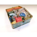 Vintage Bluebird confectionery tin containing a selection of costume jewellery, bead necklaces,