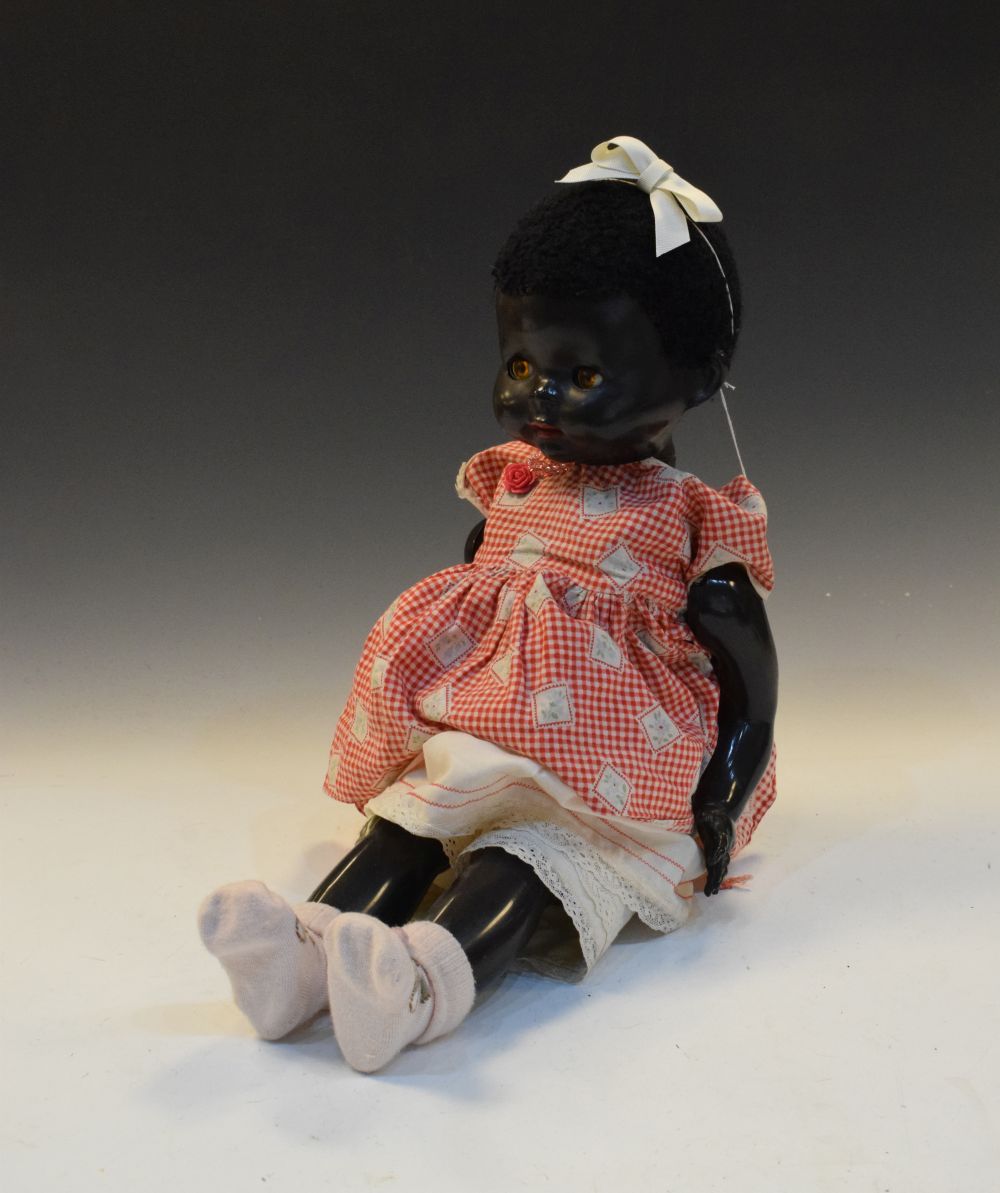 Vintage black celluloid children's doll, 55cm high