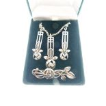 Suite of Rennie Mackintosh-style silver jewellery comprising: pendant, pair of earrings and bar