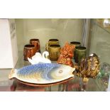 Quantity of Sylvac pottery cups, together with squirrel money bank and two fish dishes