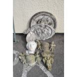 Assorted garden ornaments to include wall plaques, wall pockets, etc (7)