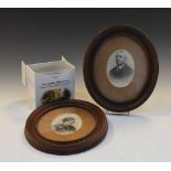 Pair of late Victorian/Edwardian oval monochrome portrait photographs within oak oval slips and