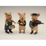 Three rare pre-war 1930's German Schuco clockwork, tinplate and felt pigs from Disney's 'Three